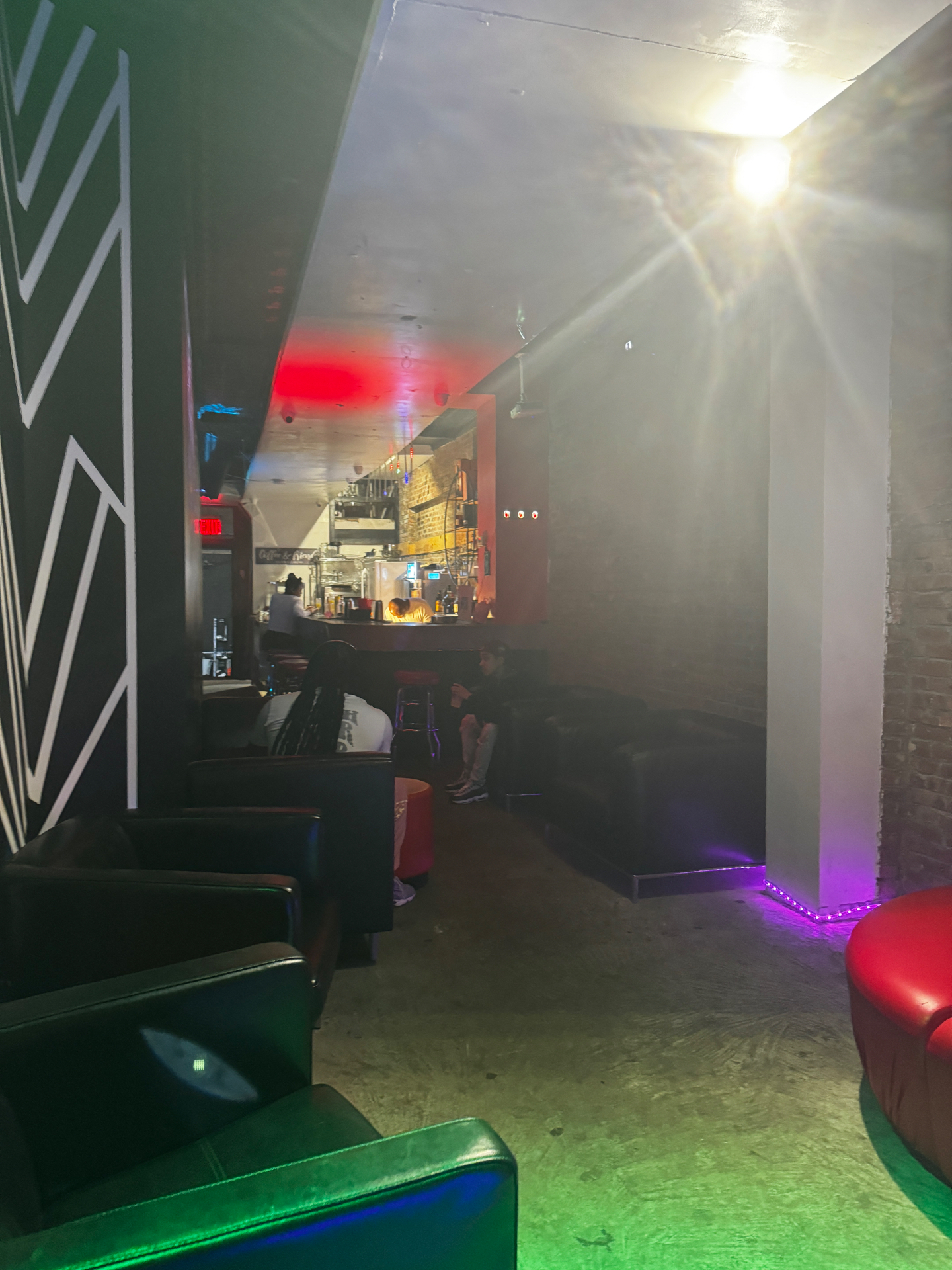 Lords Lounge interior — warm candlelit bar with velvet seating