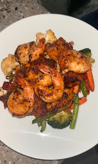 Plated West African and Caribbean fusion dish